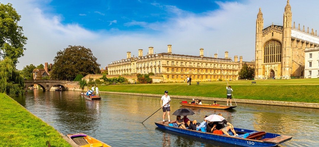Punting boat on the river Cam and King's College Chapel in Cambridge